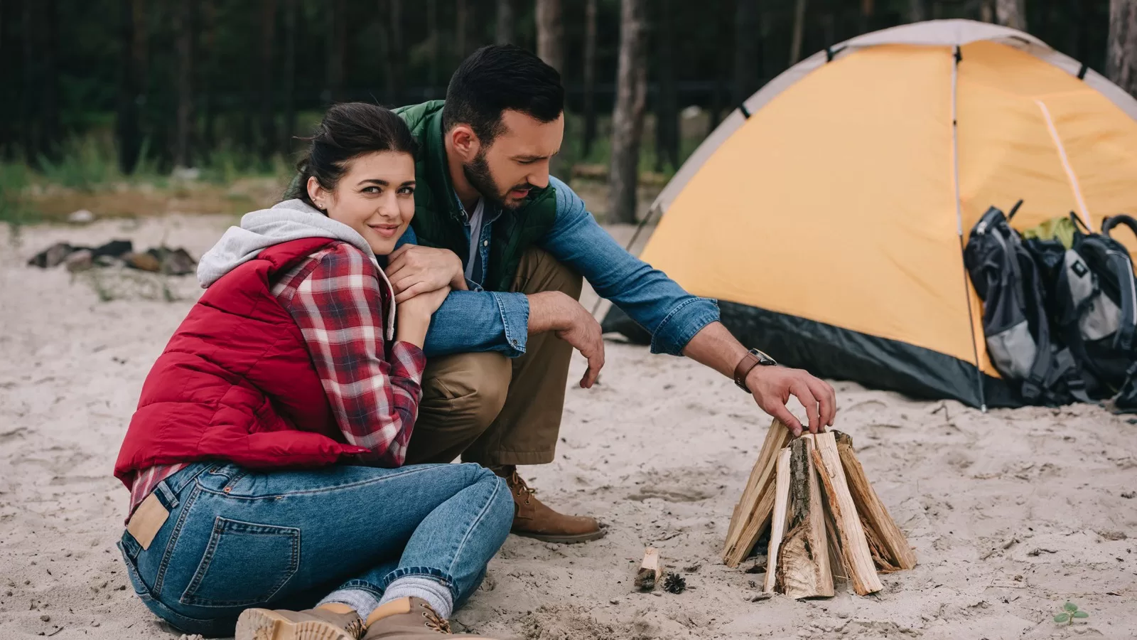 Couples camping in beach site