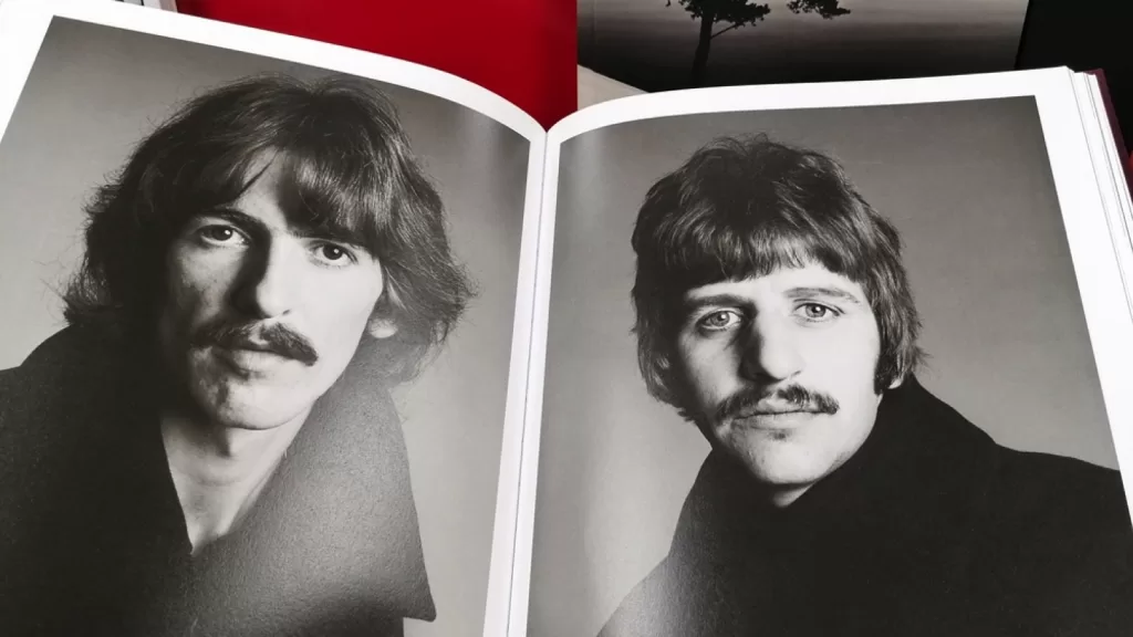Rome, Italy - May 19, 2023, detail of two portraits of George Harrison and Ringo Starr, members of the famous group The Beatles.