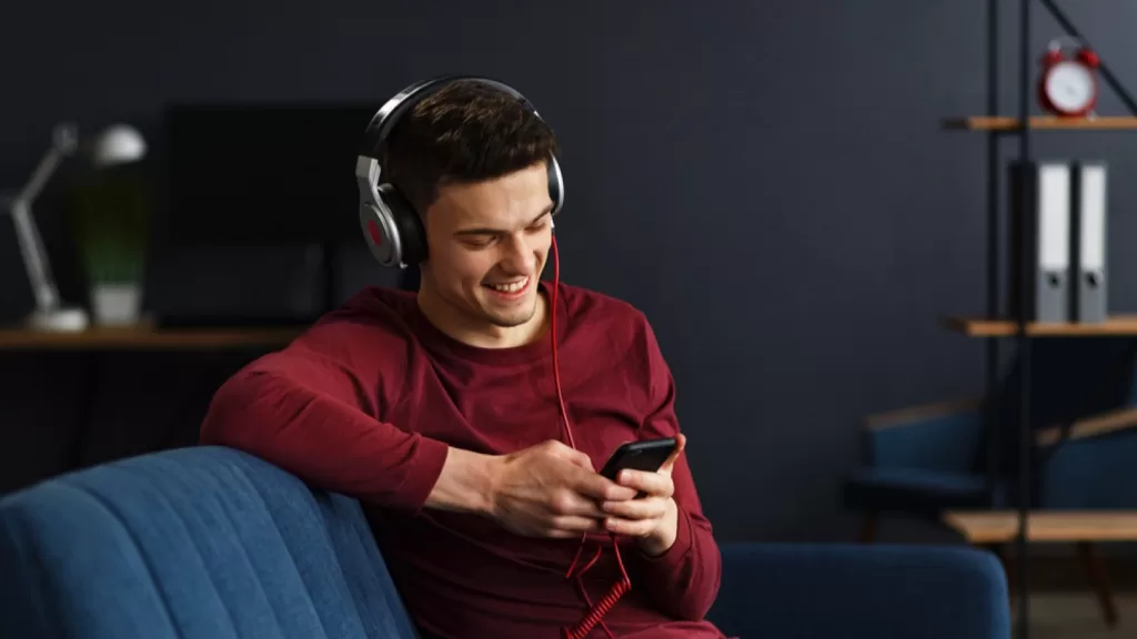 Man listening to music in mobile