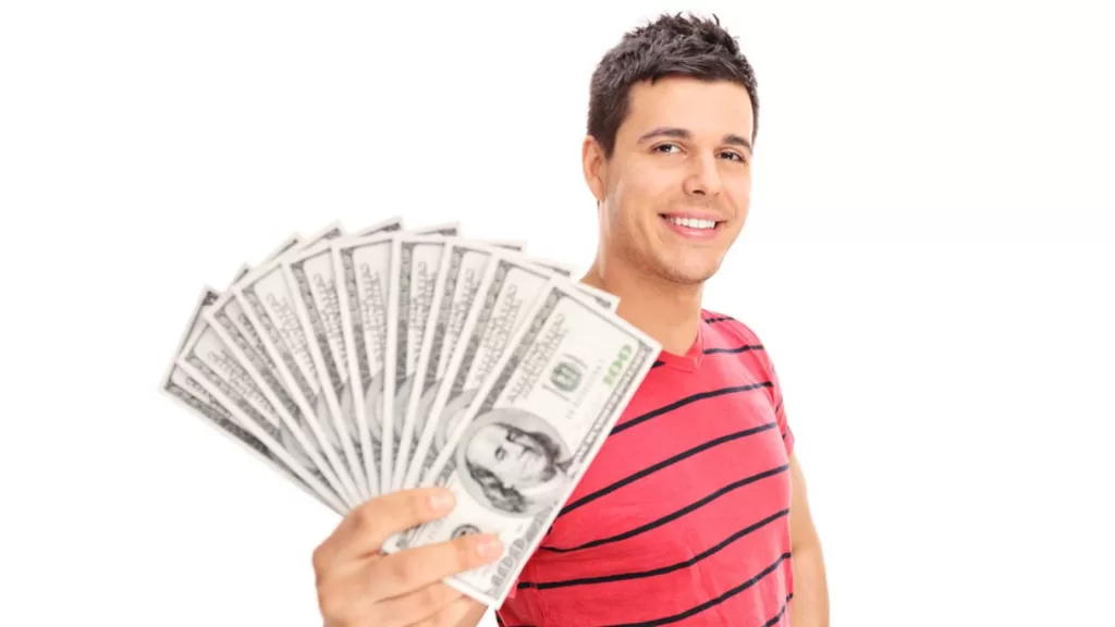 Chasing Bank Offers: Is It Worth the Hassle To Open Multiple Checking Accounts? Man with cash